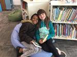 Students cozy in the library 