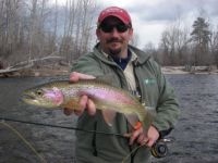 Photo of Aaron Shattuck holding a fish
