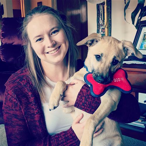 Ms. Brooks with her puppy, Lexi. 