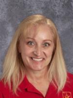 Headshot of Susie Bageant wearing a read shirt.
