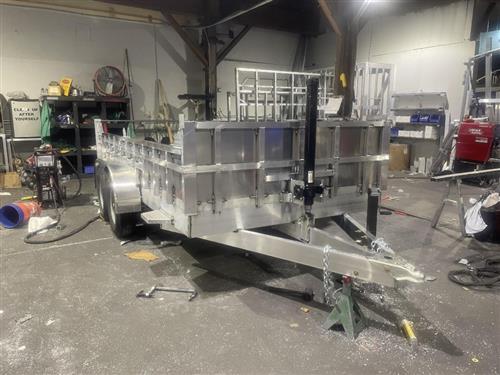 An Aluminum Trailer is shown here being worked on in a Weld Shop