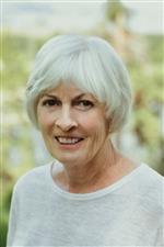 Headshot of Arlene Walker-Andrews wearing a white shirt.