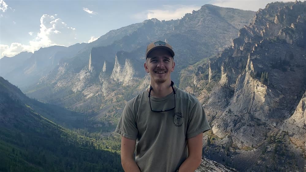 Mr. Petersen in front of the Blodgett Canyon Overlook in Hamilton. 