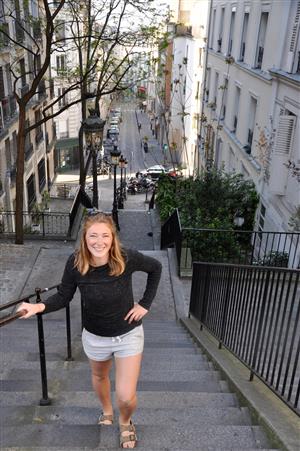Me walking up some stairs in Montmartre