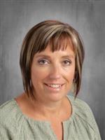 image of bookkeeper Alesia wearing green